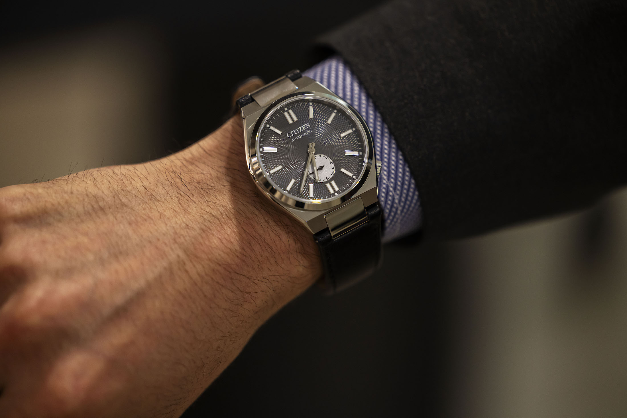 A citizen watch on a man's wrist