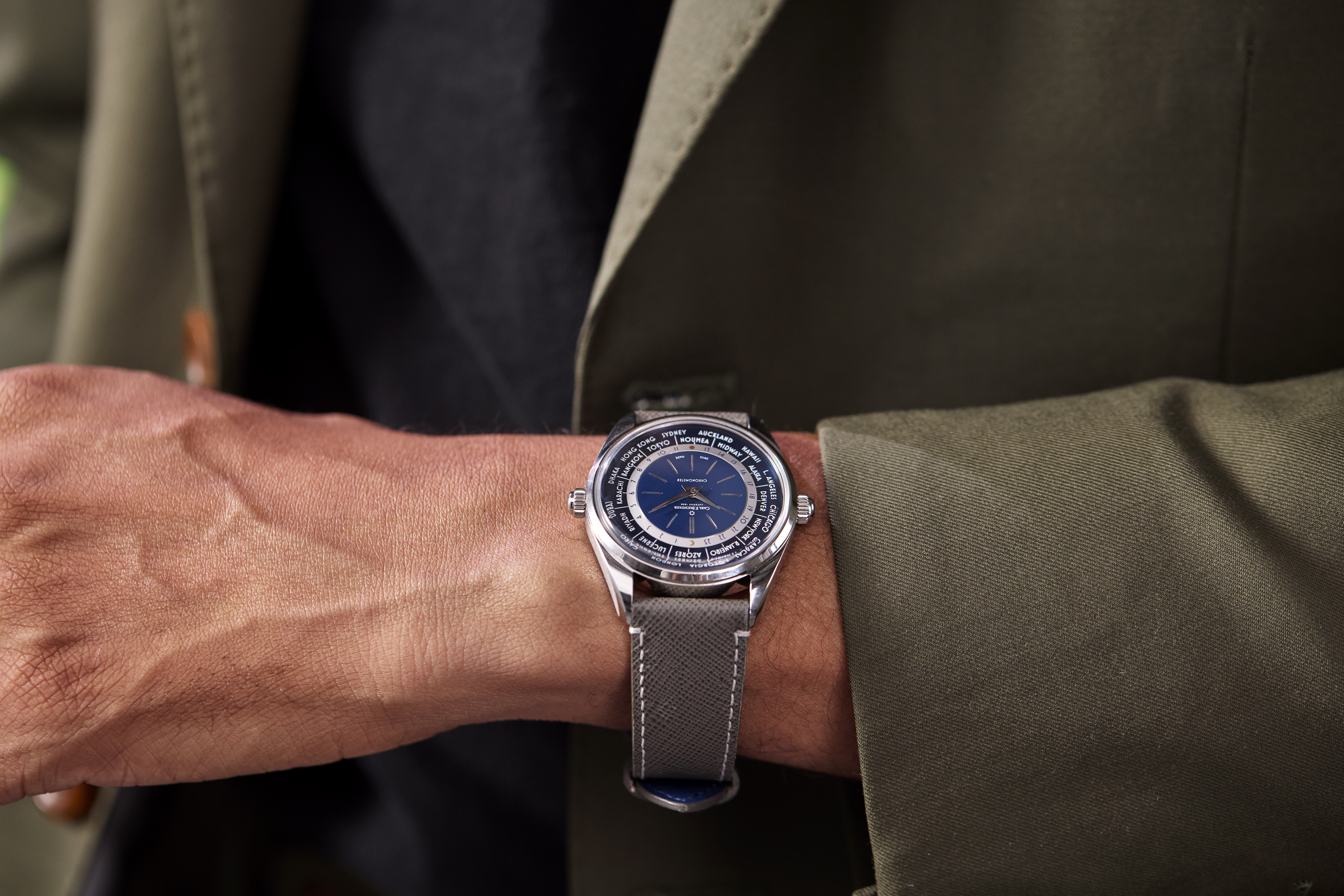 man in suit wearing watch