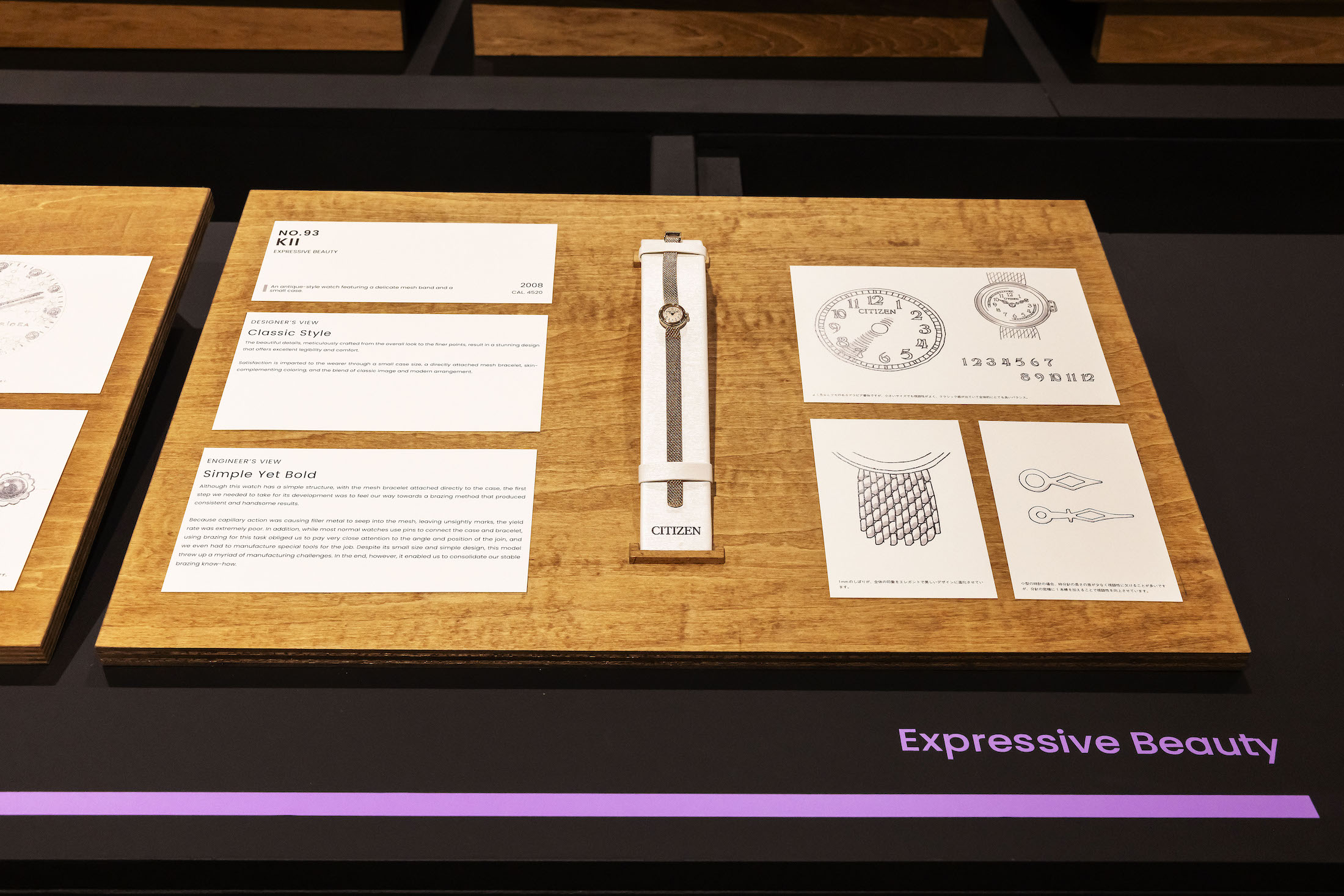 A thin bejeweled watch. Expressive Beauty written below it