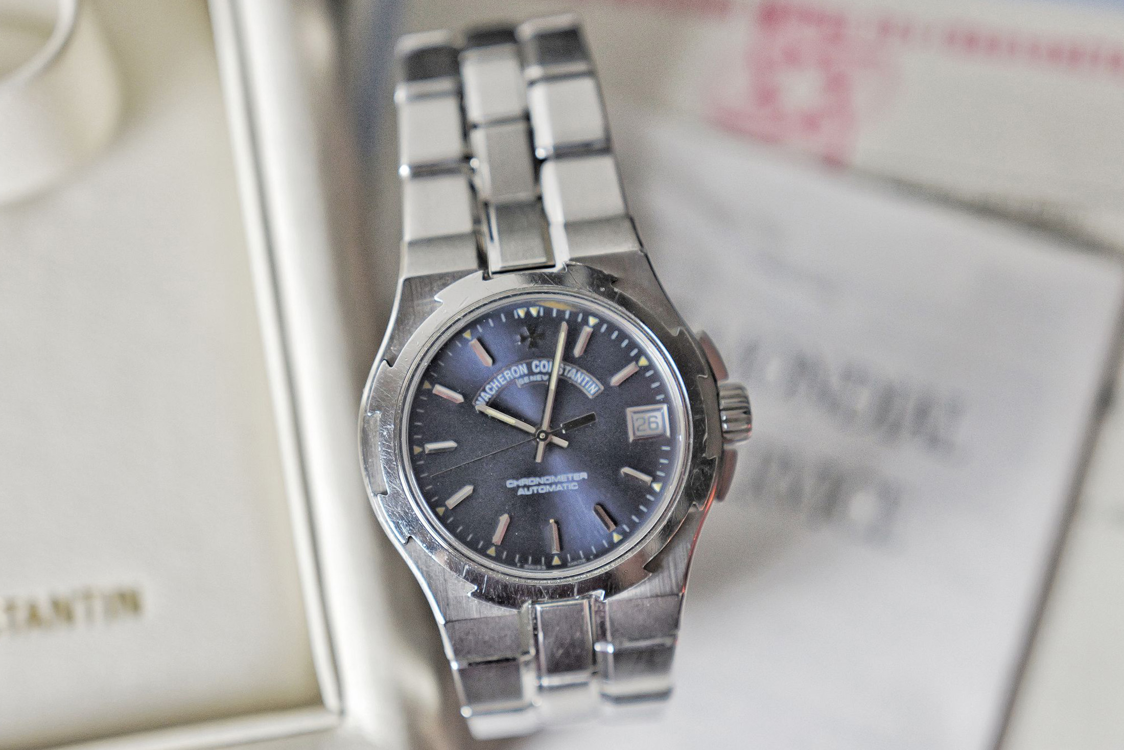 Bring a Loupe: An Omega Suverän, A Universal Genève Cabriolet, A Vacheron Constantin Overseas, And A Vintage Zenith Chronograph