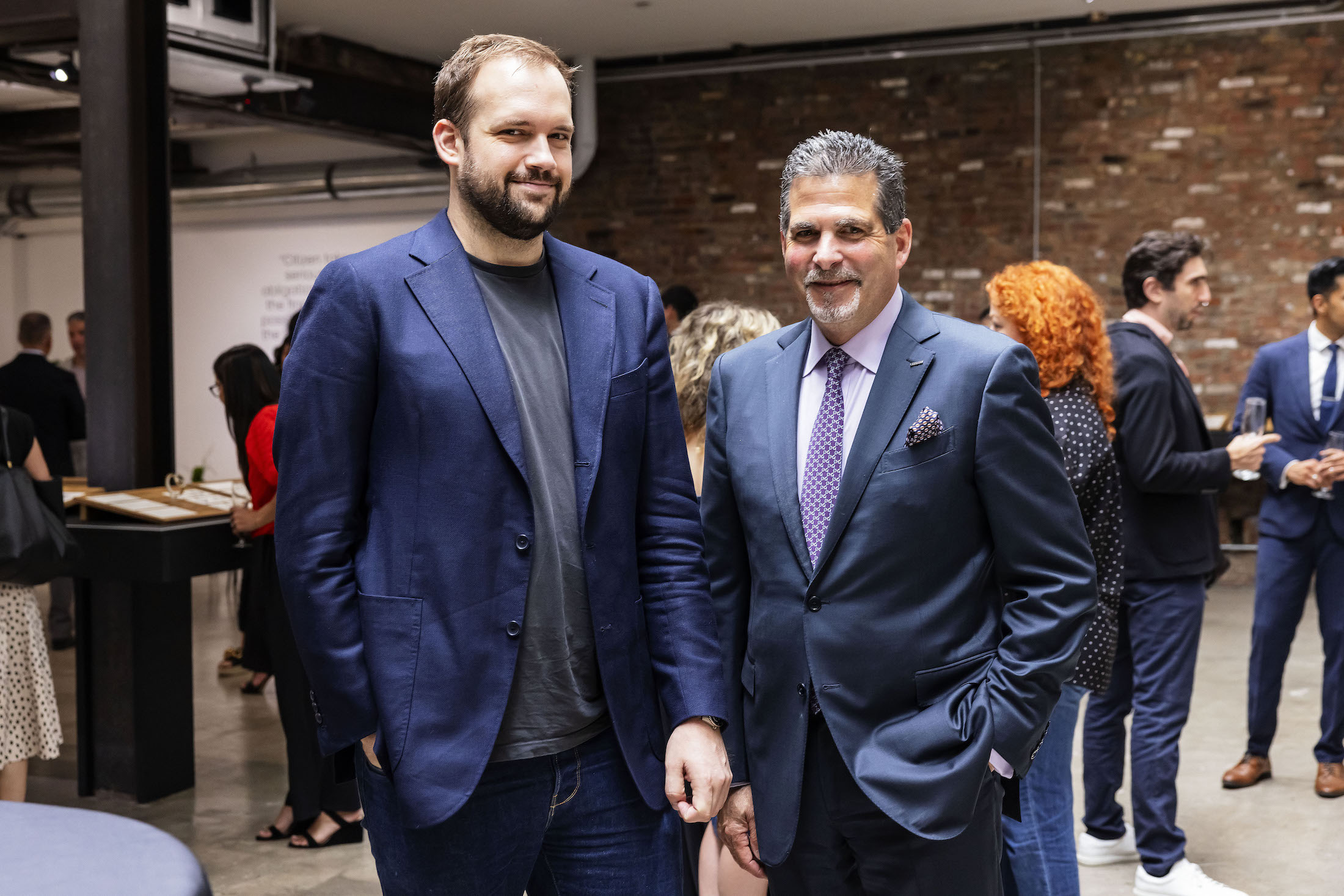 Two men standing for a photo