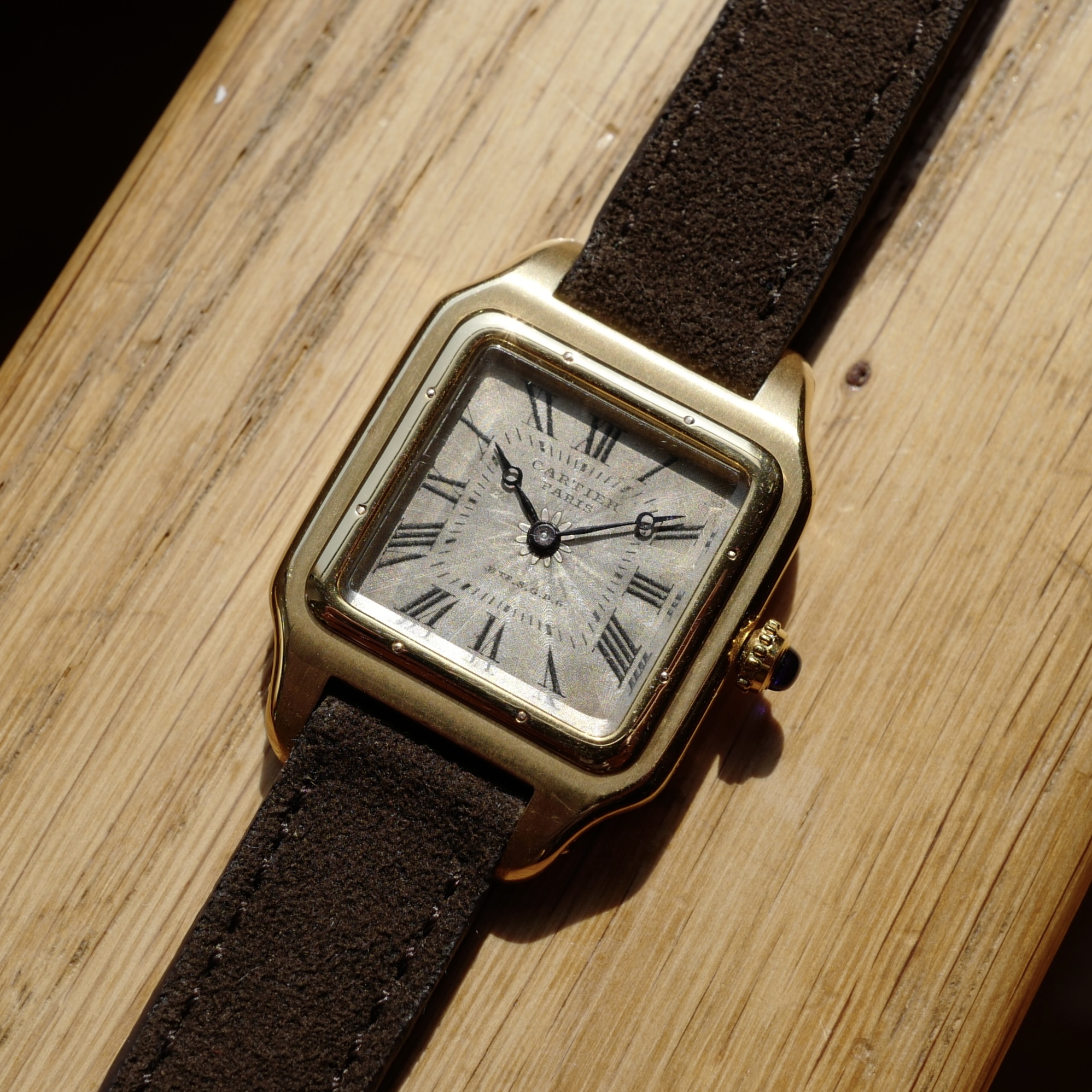 A Cartier Santos in yellow gold