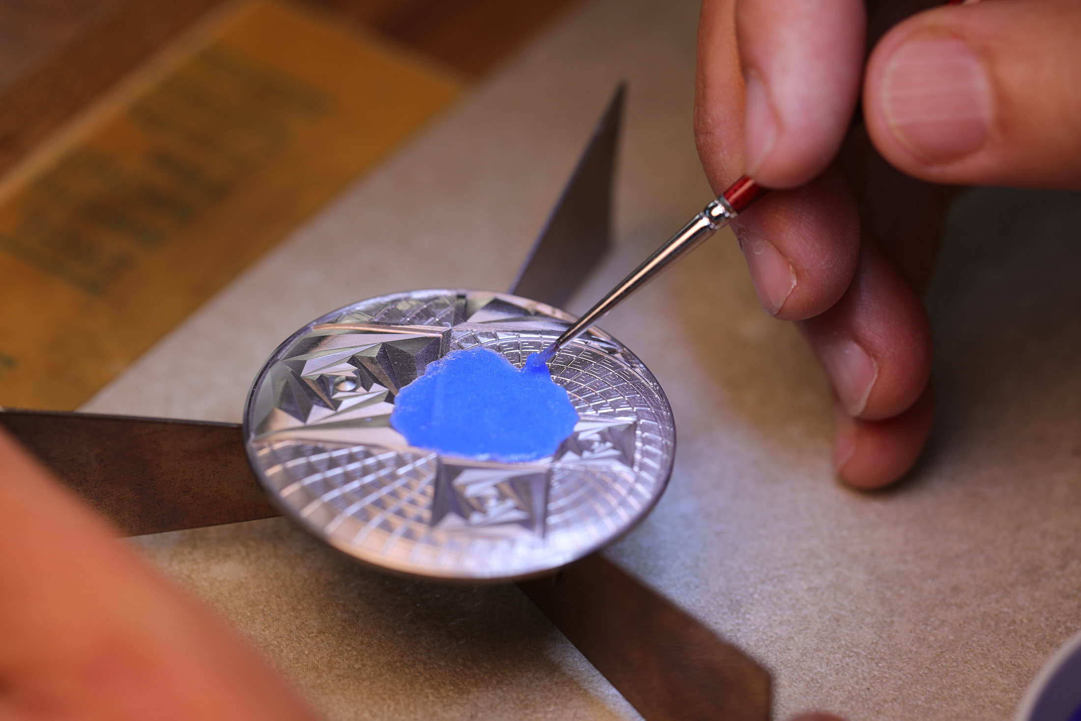 Enamel being applied to La Rose Carrée pocket watch