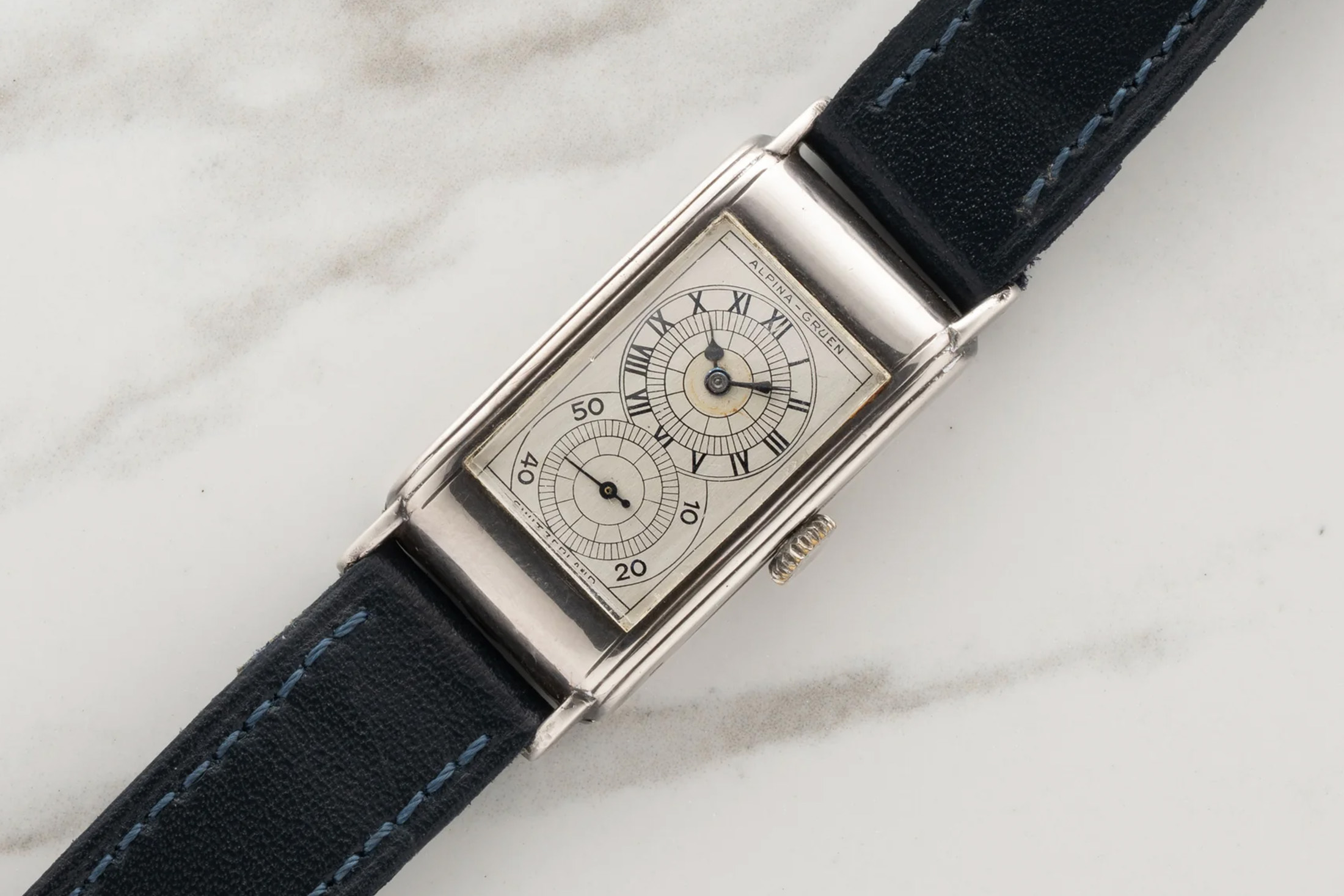 Bring a Loupe: An Alpina-Gruen Techni-Quadron, A Universal Genève "Eric Clapton," A Cartier "Bebe Guillotine," And More