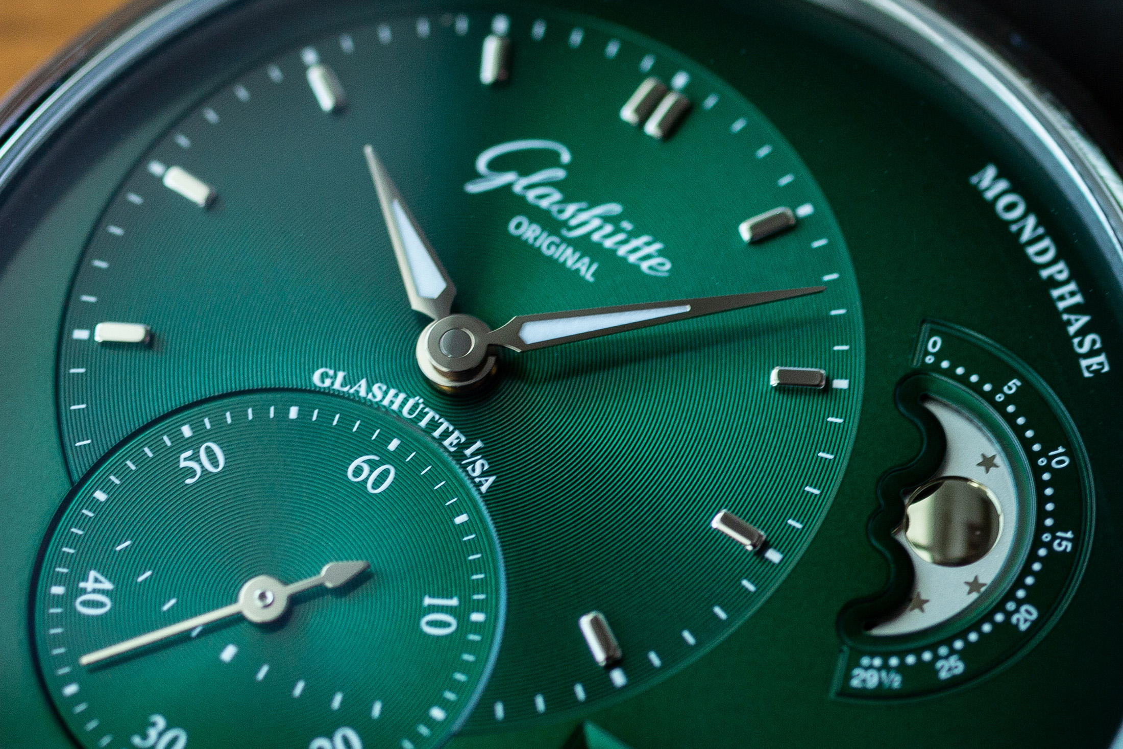 very close up green watch