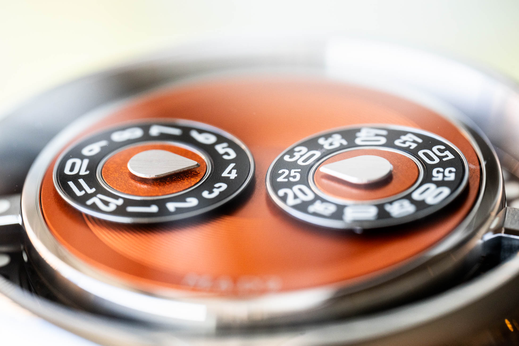Slanted depth view of MAD2 orange dial