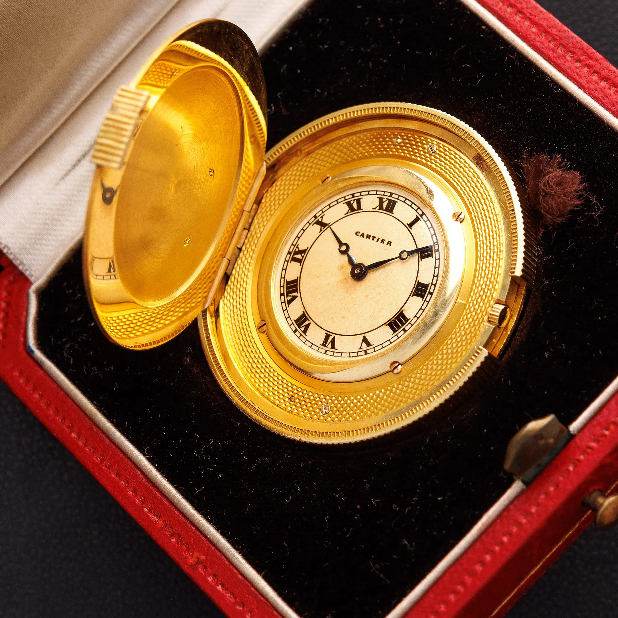A Cartier coin watch