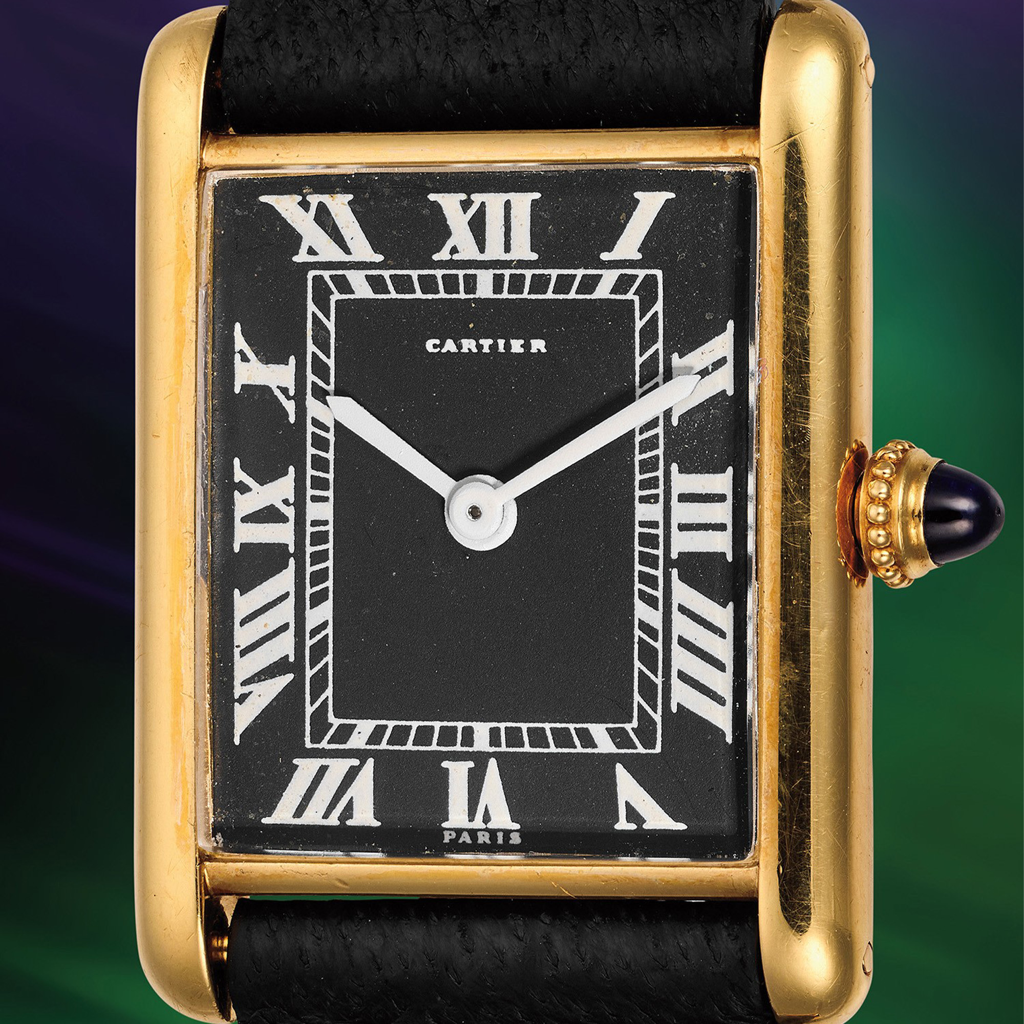 A black-dialed Cartier Tank Louis