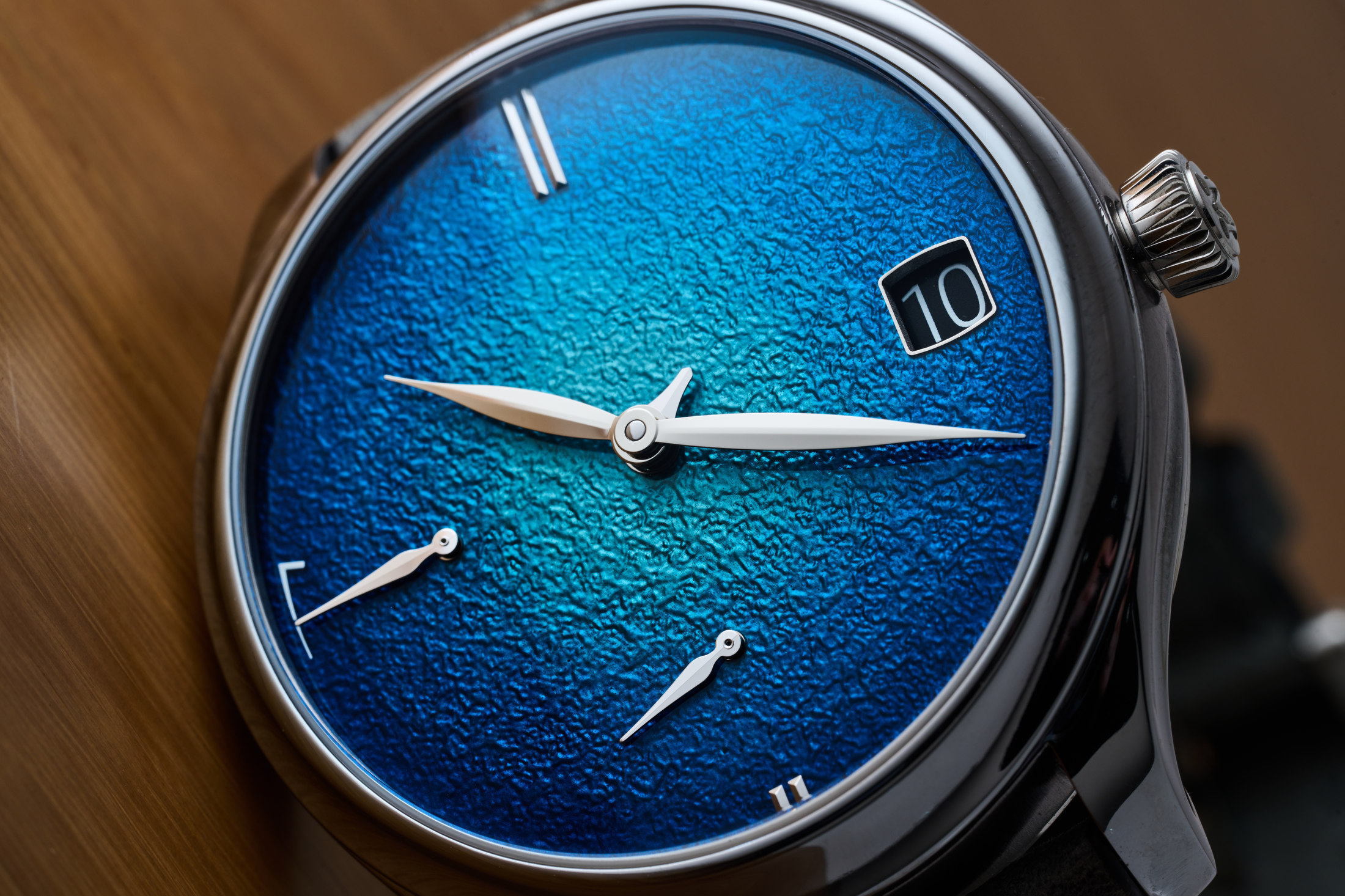 The dial of the new Moser Endeavor Perpetual Calendar with fumé grand feu enamel dial