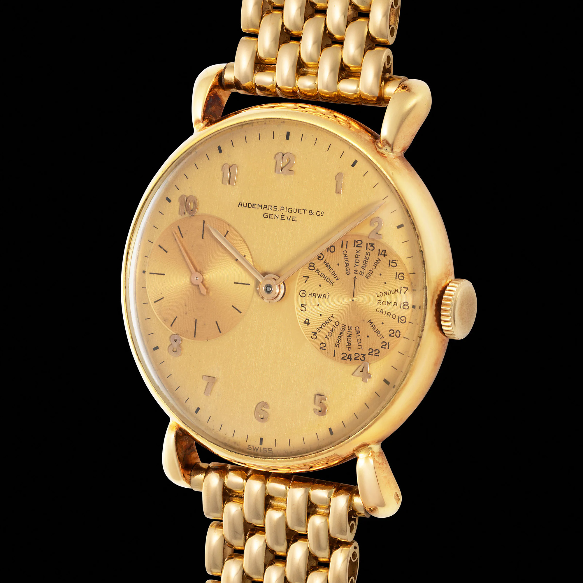 A yellow gold 1943 world time Audemars Piguet