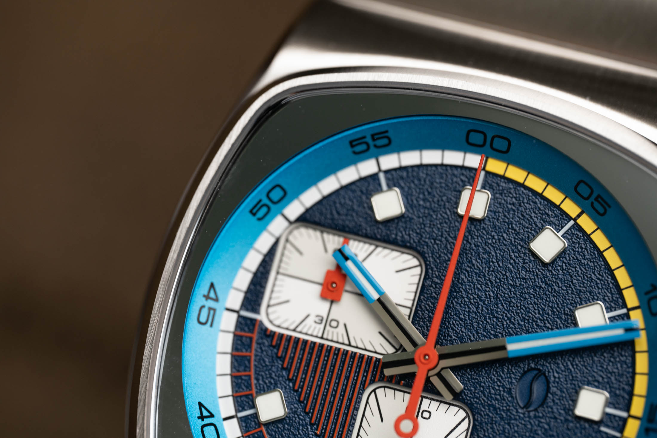 top corner of blue dial